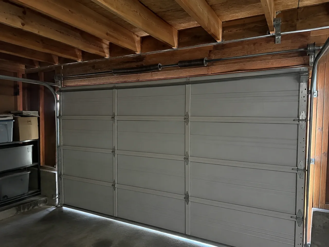 Broken garage door spring on a Poulsbo, WA home before Boost Garage Doors replaced it.