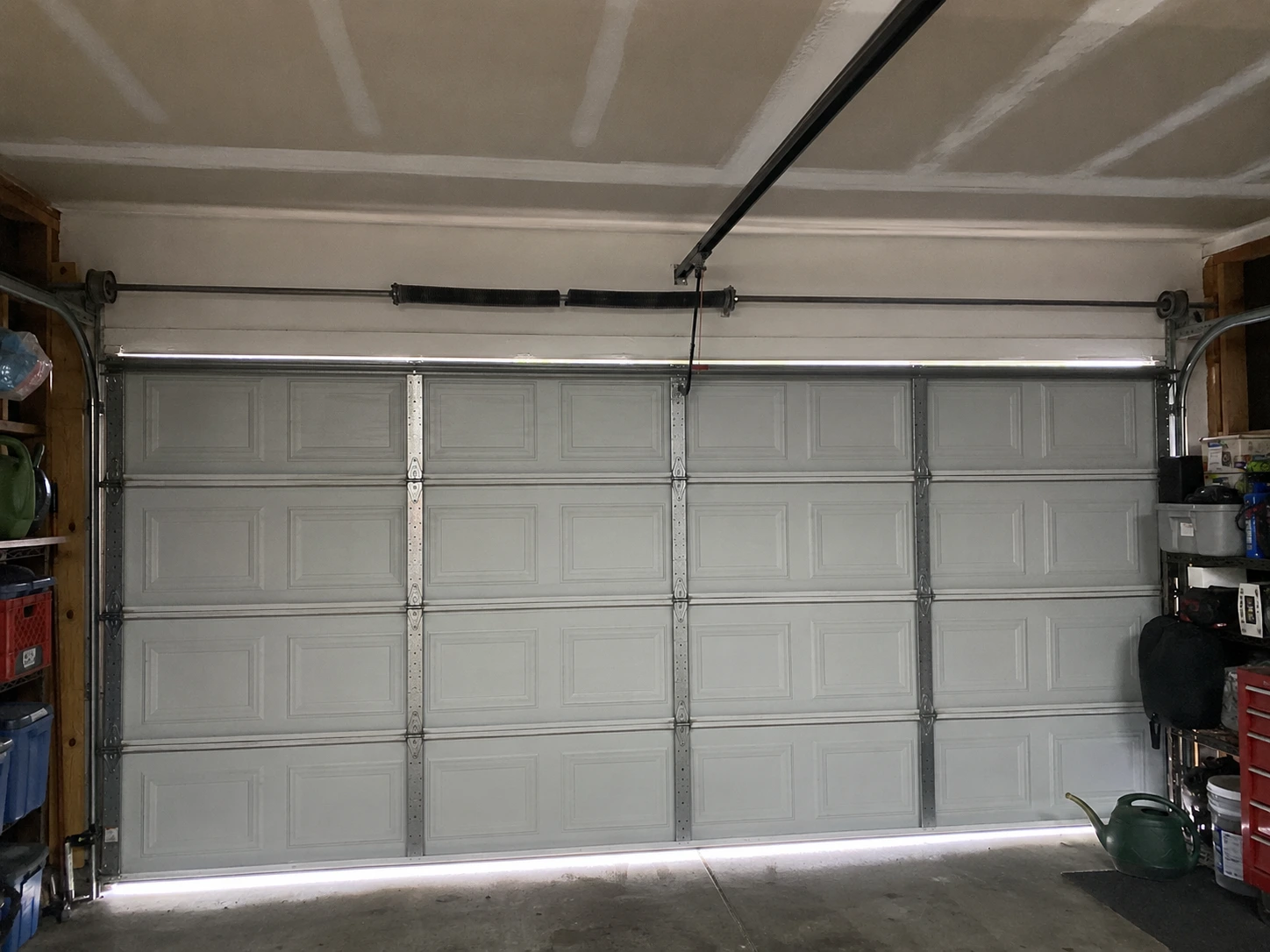 Broken garage door torsion spring on a Bremerton, WA home, before repair by Boost Garage Doors.