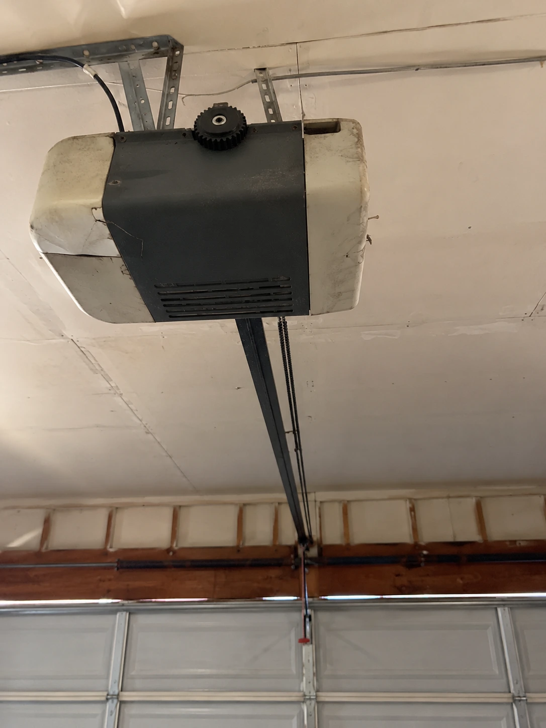 Failing garage door opener on a Vashon Island, WA garage before repair by Boost Garage Doors.