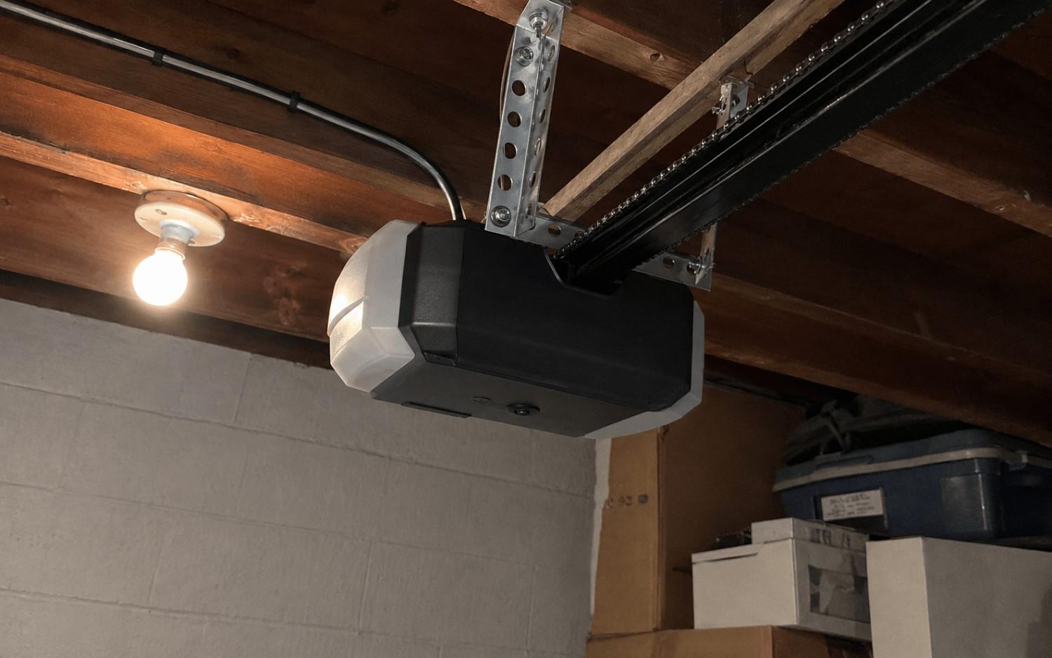 A new opener mounted clean on the rail with tidy wiring, installed by Boost Garage Doors.